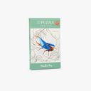 Cutia puzzle-ului 3D Gândacul Hercule lângă figurina montată