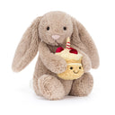 Iepurașul Bashful ținând un tort aniversar din pluș, vedere frontală