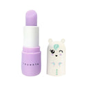 Balsamul de buze Zoomania Inuwet cu aromă de bezea, deschis, alături de capacul unicorn