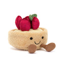 Tarta Fleurette bej, cu căpșuni roșii deasupra și picioare maro