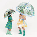Children holding illustrated Djeco umbrellas