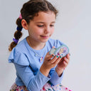 Copil privind în oglinda de mână Magical Unicorn