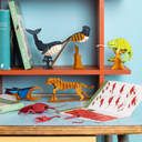 Puzzle-uri 3D Moulin Roty asamblate pe rafturi, cu balenă, pasăre, cameleon, ghepard și crustacee