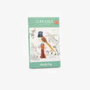 Cutia puzzle-ului 3D Pasărea paradisului lângă figurina montată